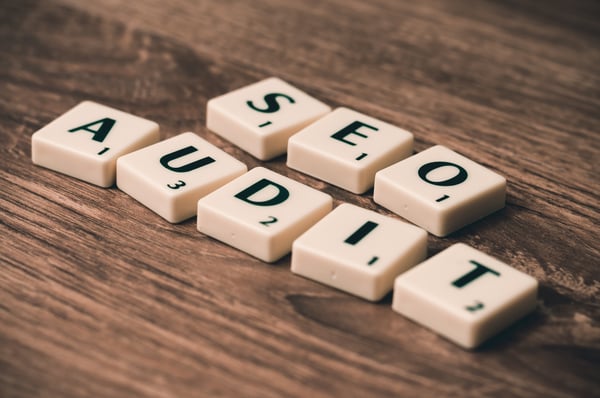 Scrabble letters arranged to read, SEO audit