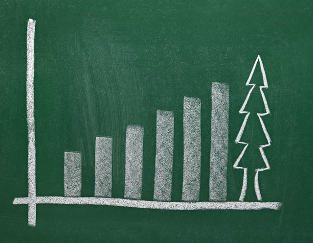 close up of chalkboard with finance business graph and christmas tree.jpeg