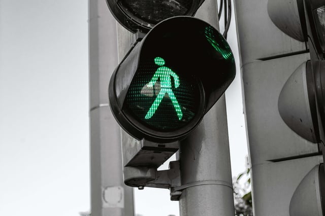 Close-up photo of a green traffic light